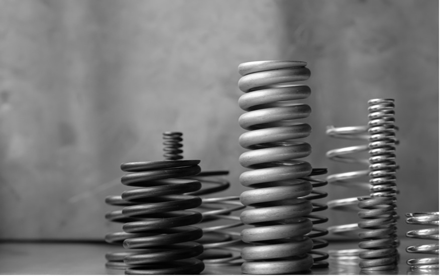 Several metal springs on a table